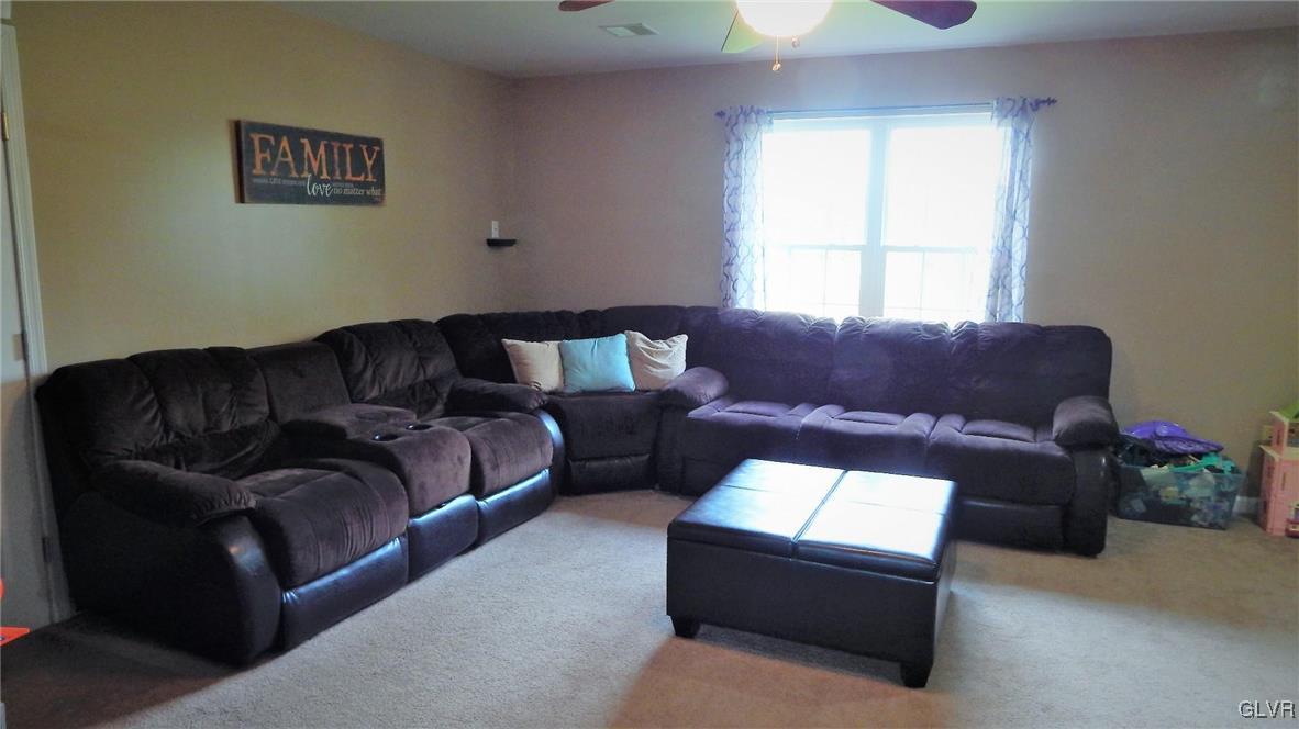 1160 Newlins Road West Easton, PA 18040 - Photo 11 of 12 a living room with a couch and a window
