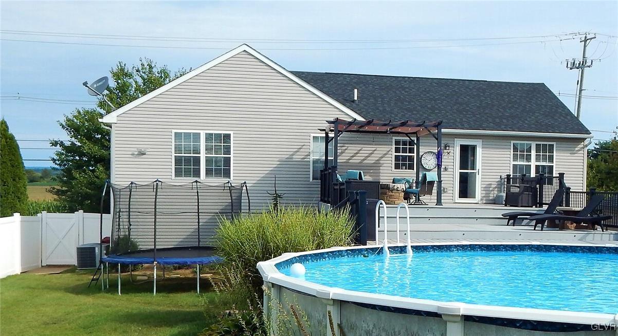 1160 Newlins Road West Easton, PA 18040 - Photo 3 of 12 a swimming pool with outdoor seating and yard