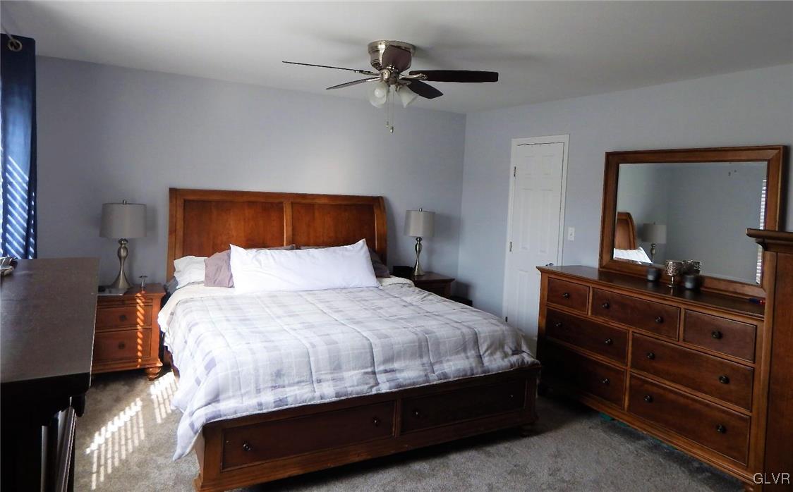 1160 Newlins Road West Easton, PA 18040 - Photo 8 of 12 a bedroom with a bed and a dresser