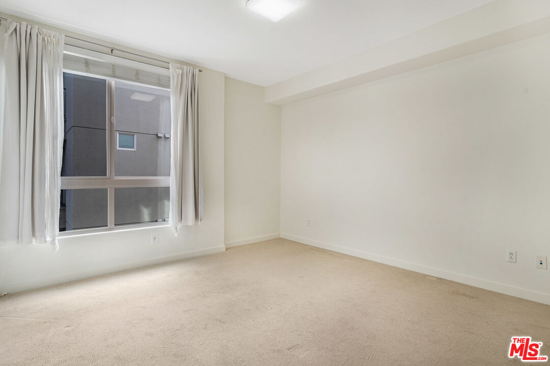 13044 Pacific Promenade, Unit 417 Playa Vista, CA 90094 - Photo 15 of 31 a view of an empty room with a window