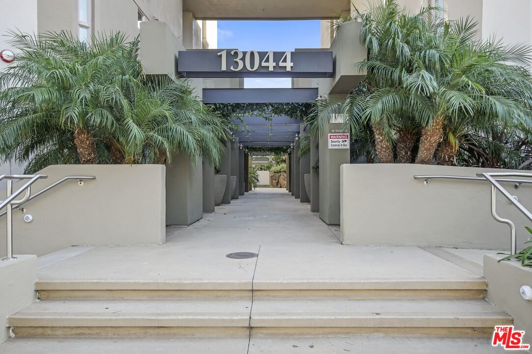 13044 Pacific Promenade, Unit 417 Playa Vista, CA 90094 - Photo 22 of 31 a view of a house with a bench