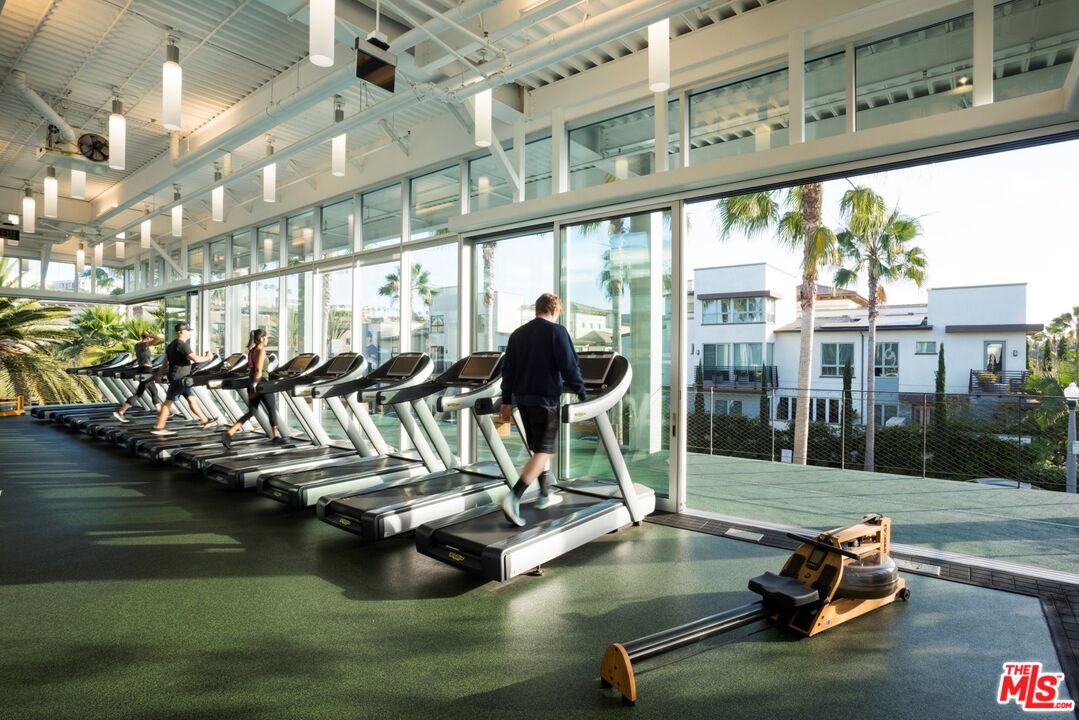 13044 Pacific Promenade, Unit 417 Playa Vista, CA 90094 - Photo 29 of 31 a view of a swimming pool with a patio and lake view