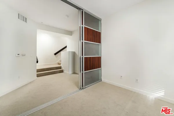 a view of a livingroom with entryway
