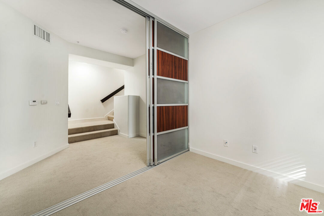 13044 Pacific Promenade, Unit 417 Playa Vista, CA 90094 - Photo 10 of 31 a view of a livingroom with entryway