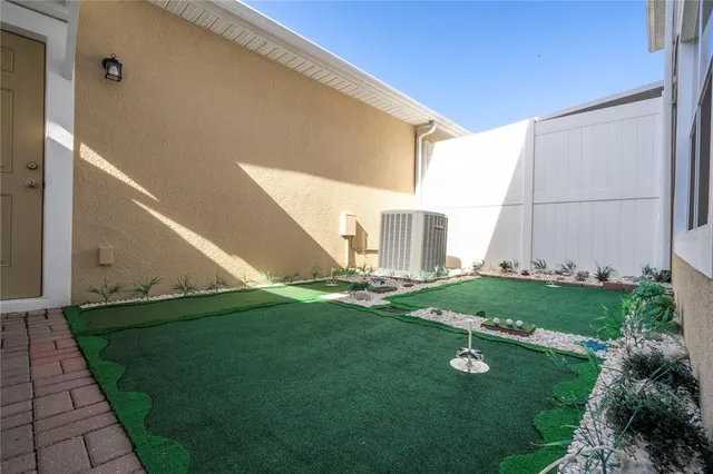 a view of a back yard of the house