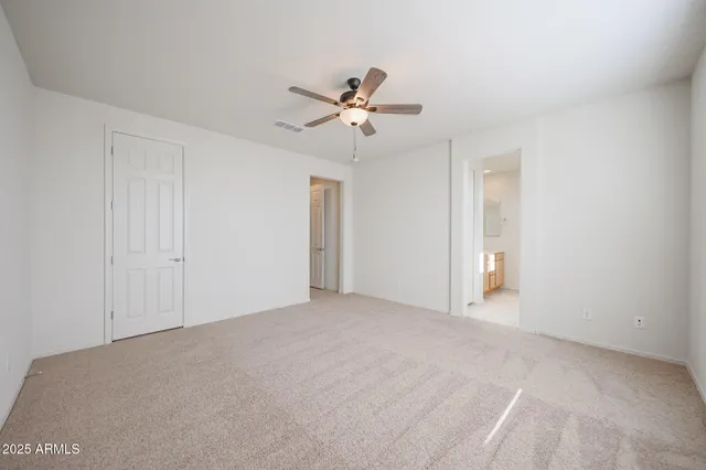 a view of a ceiling fan in a room