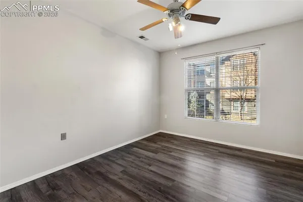a view of an empty walk in closet