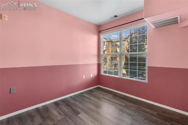 wooden floor and windows in a room