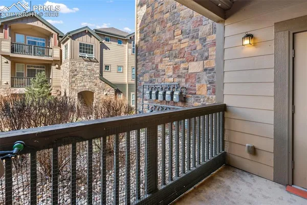 a view of a building with a yard