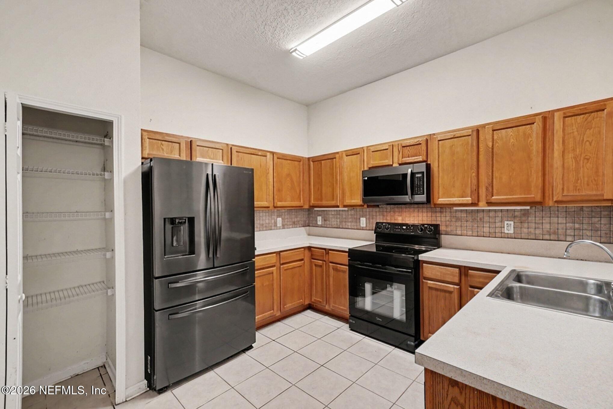 7920 Merrill Road, Unit 1808 Jacksonville, FL 32277 - Photo 9 of 23 009_file_7552