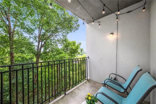 a view of a balcony with chair