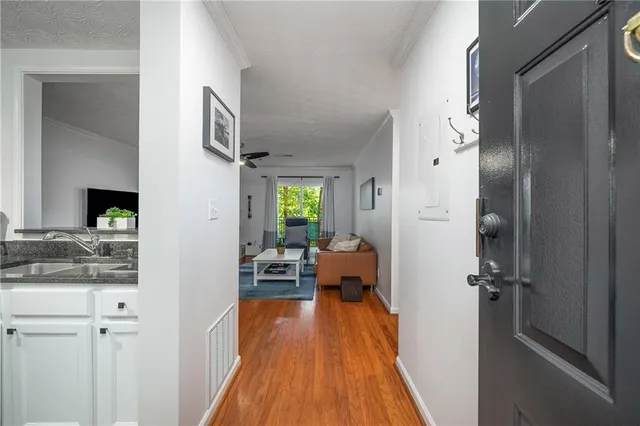 a view of a living room and bathroom