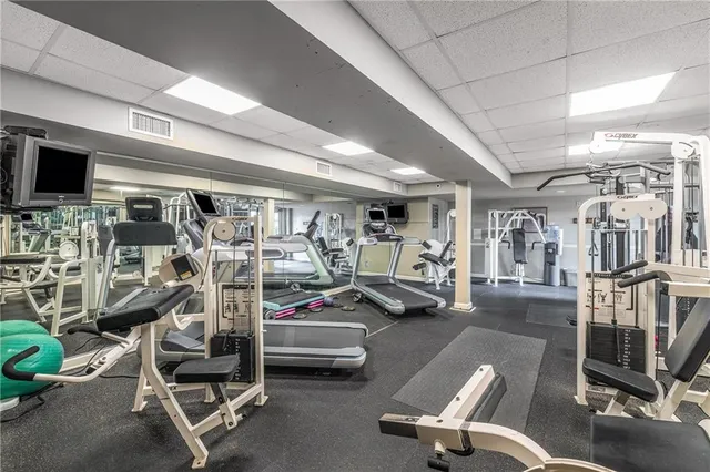 a view of backyard with seating and green space