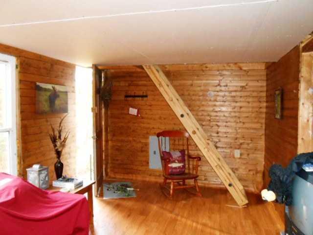 141 S Road Kents Hill, ME 04349 - Photo 15 of 16 Living Room. stairs to loft- door to...