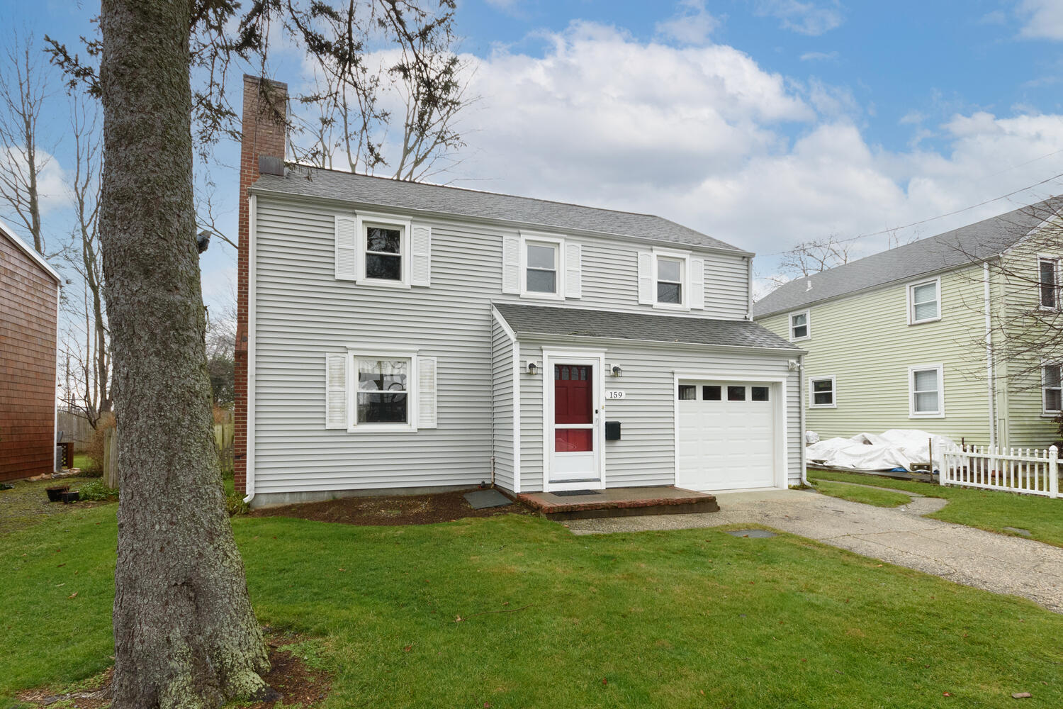 159 Hollow Tree Ridge Road Darien, CT 06820 - Photo 2 of 20 a front view of house with yard