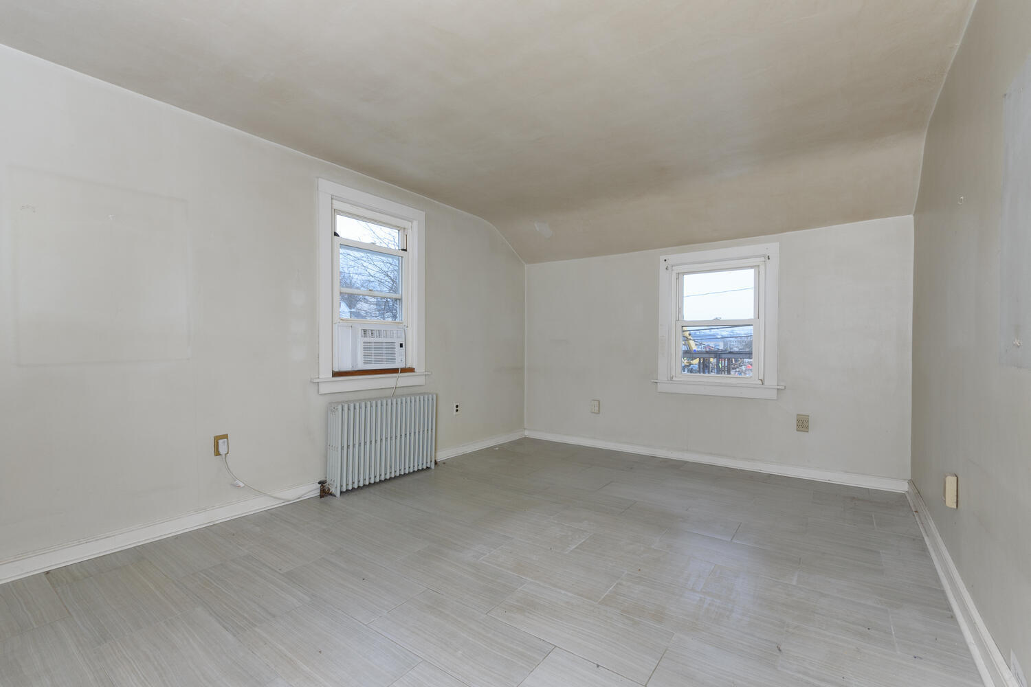 159 Hollow Tree Ridge Road Darien, CT 06820 - Photo 10 of 20 an empty room with windows