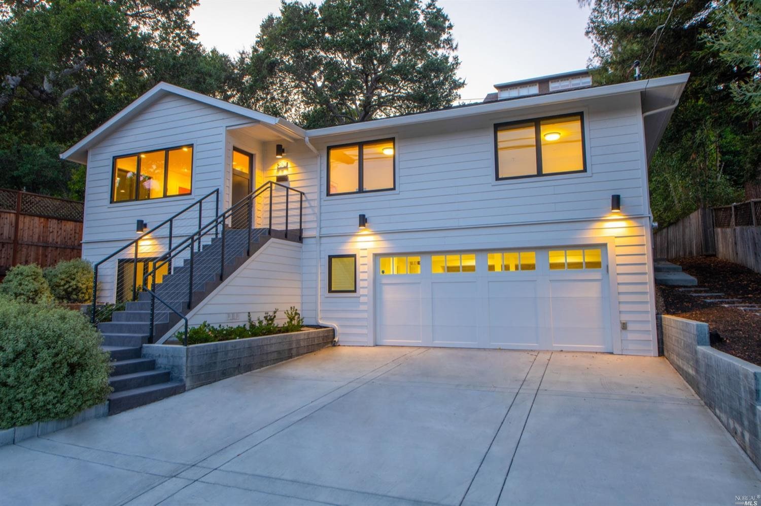304 Bolinas Avenue San Anselmo, CA 94960 - Photo 1 of 1 a front view of a house with a yard and potted plants