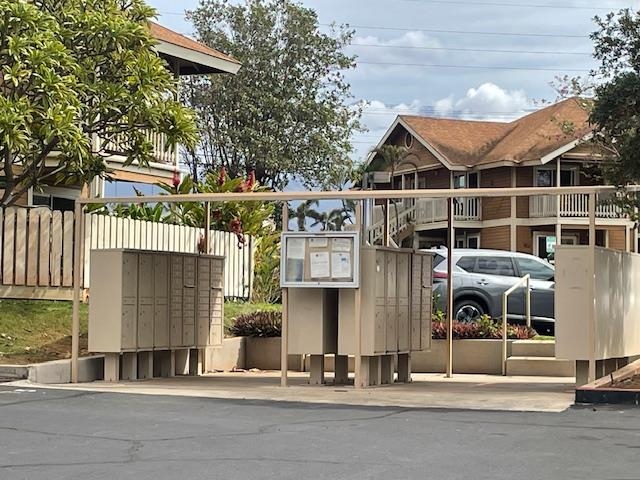 140 Uwapo Road, Unit 4204 Kihei, HI 96753 - Photo 11 of 12 a front view of a house with a street