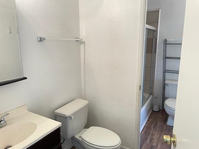 140 Uwapo Road, Unit 4204 Kihei, HI 96753 - Photo 6 of 12 a white toilet sitting next to a bathroom sink