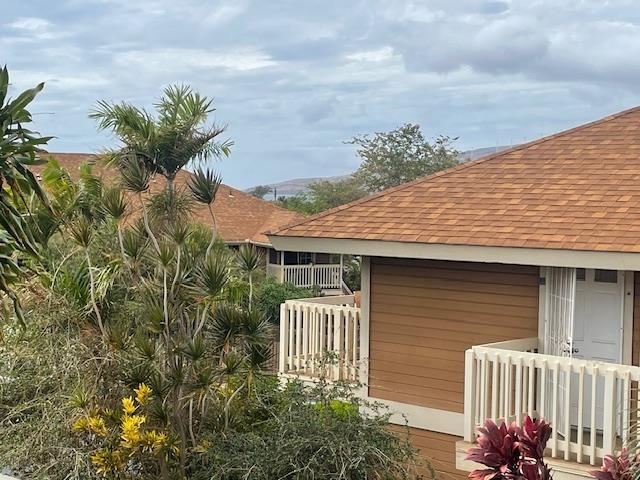 140 Uwapo Road, Unit 4204 Kihei, HI 96753 - Photo 10 of 12 a front view of a house with a yard