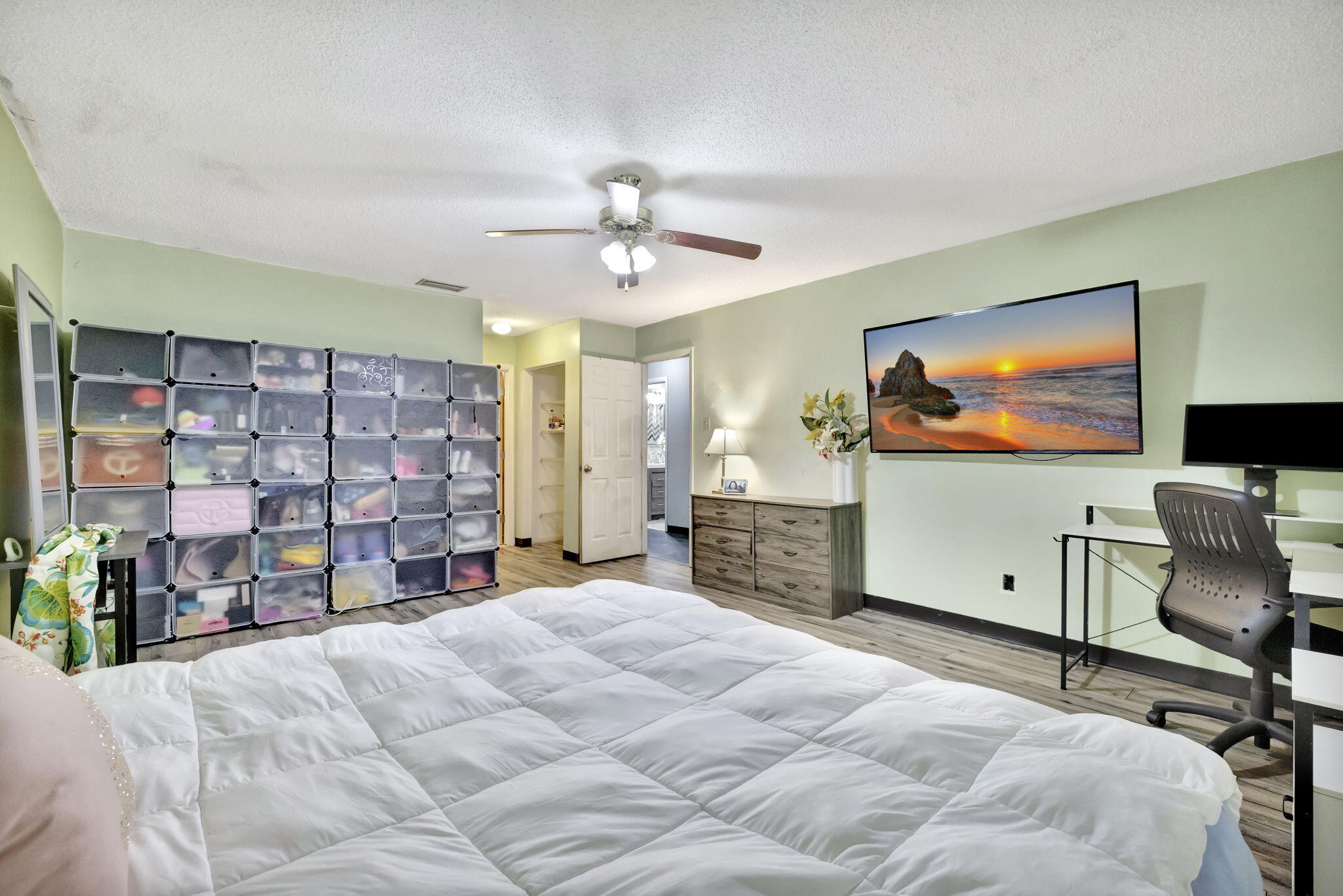 2080 Colonial Road, Unit 1 Fort Pierce, FL 34950 - Photo 13 of 21 a view of a livingroom with furniture and a flat screen tv