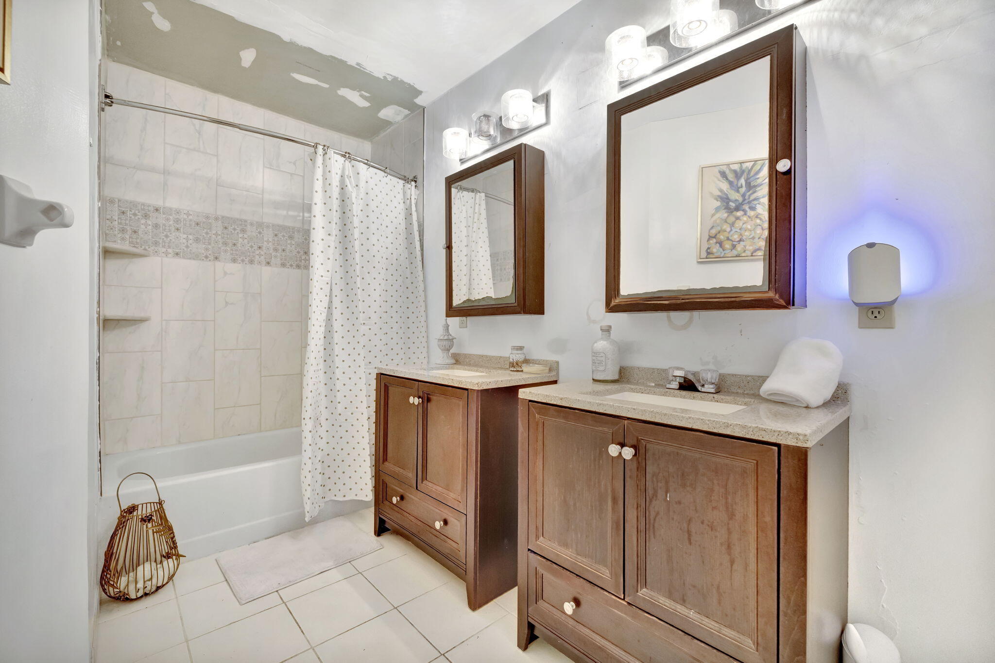 2080 Colonial Road, Unit 1 Fort Pierce, FL 34950 - Photo 15 of 21 a bathroom with a tub sink and mirror