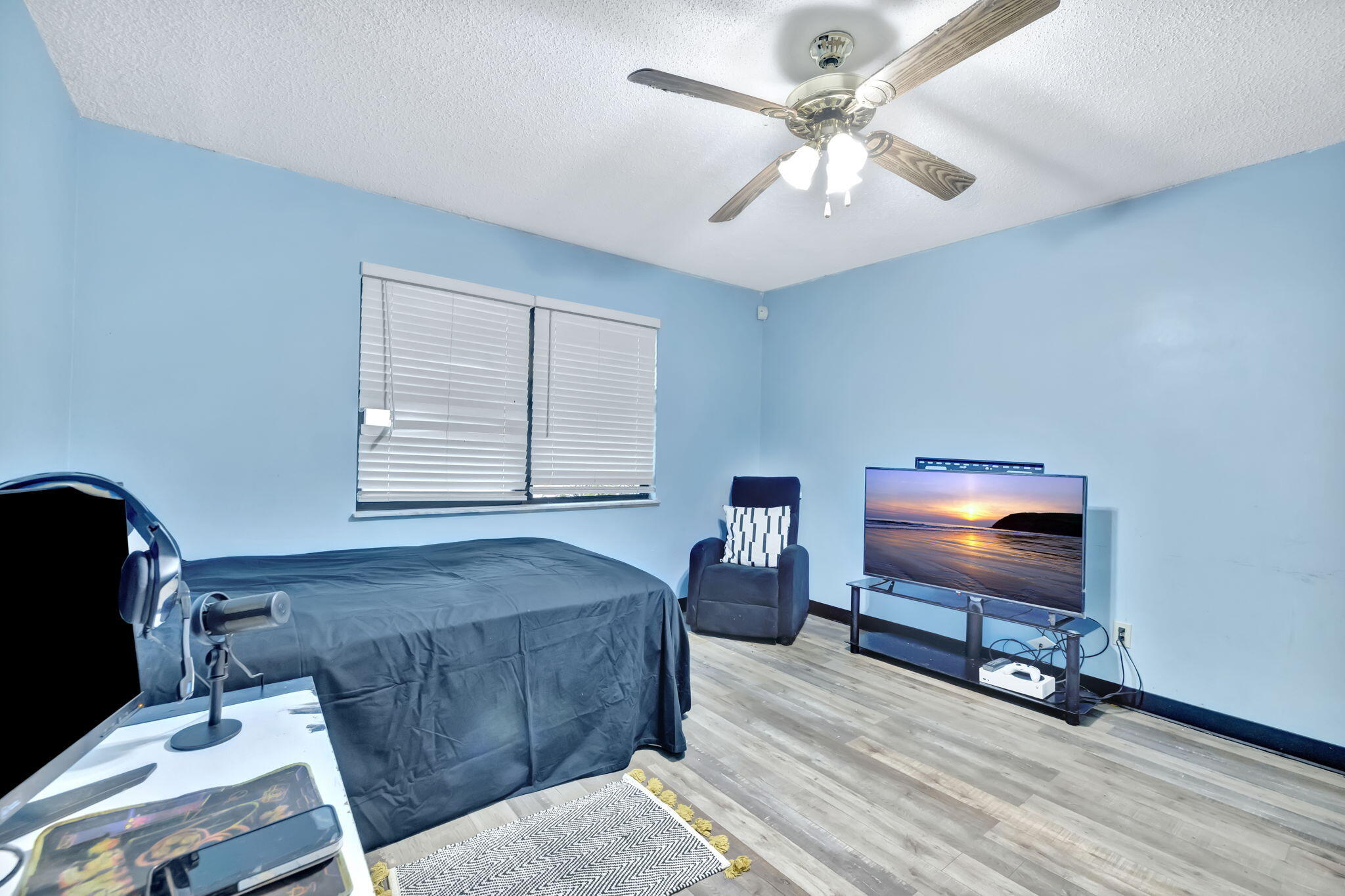 2080 Colonial Road, Unit 1 Fort Pierce, FL 34950 - Photo 16 of 21 a living room with furniture and a flat screen tv