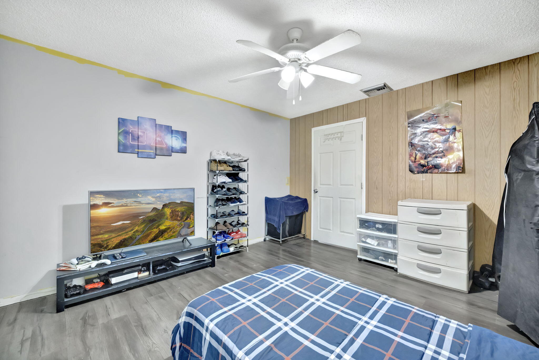 2080 Colonial Road, Unit 1 Fort Pierce, FL 34950 - Photo 18 of 21 a living room with furniture and a flat screen tv