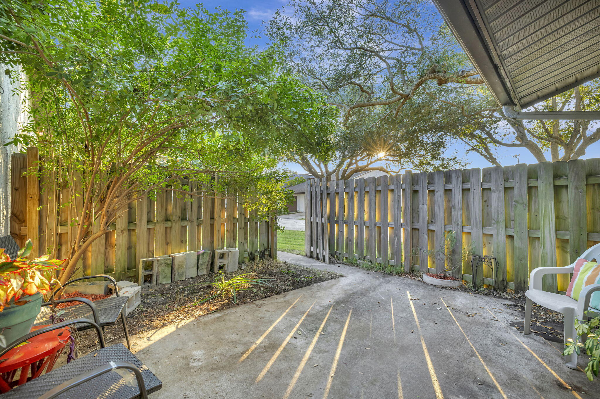 2080 Colonial Road, Unit 1 Fort Pierce, FL 34950 - Photo 8 of 21 a front view of a house with a garden