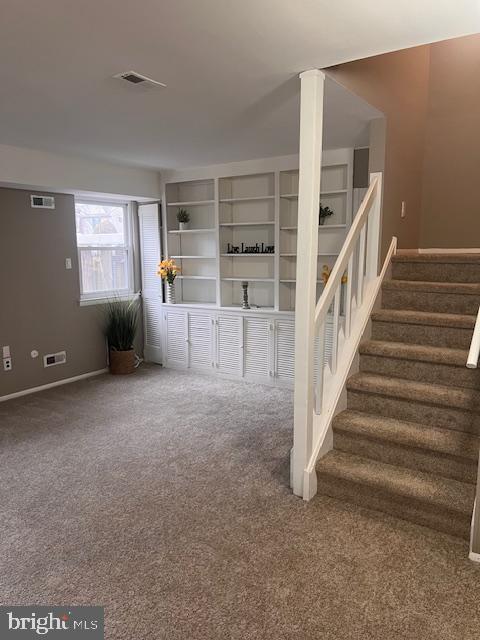 15 Noble Road Sicklerville, NJ 08081 - Photo 8 of 21 a view of an empty room with stairs and windows