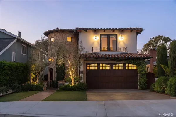 a front view of a house with yard