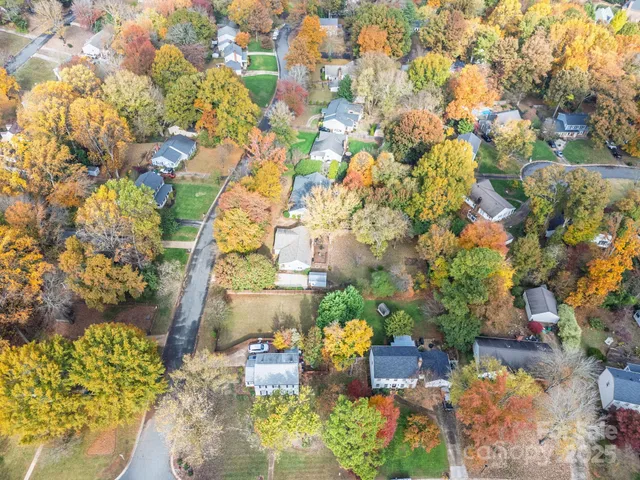 a view of city and green space