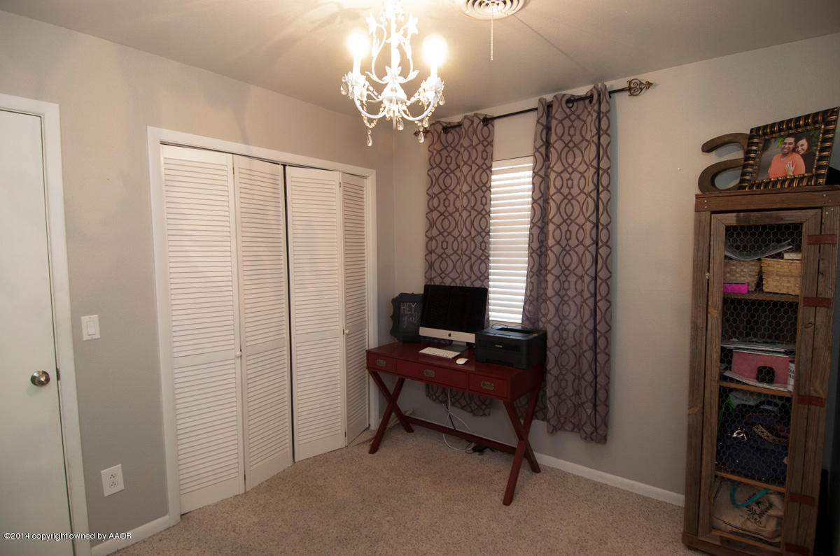 2607 Darrell Avenue Amarillo, TX 79110 - Photo 24 of 28 a view of a livingroom with furniture and a window