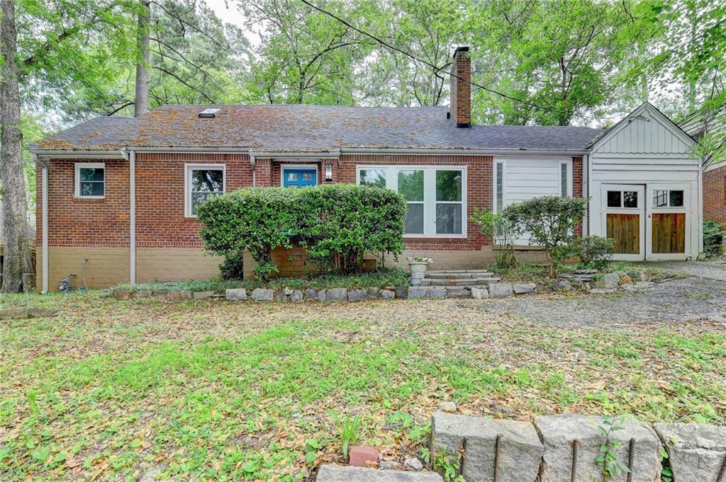 2470 North Decatur Road Decatur, GA 30033 - Photo 1 of 1 front view of a house with a yard