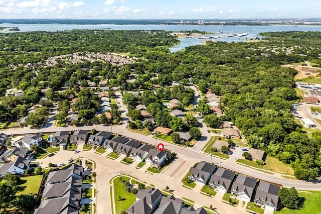an aerial view of residential building and ocean
