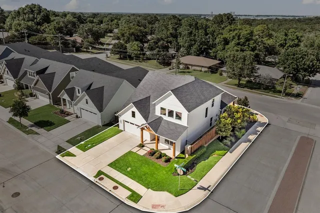 an aerial view of a house with a garden