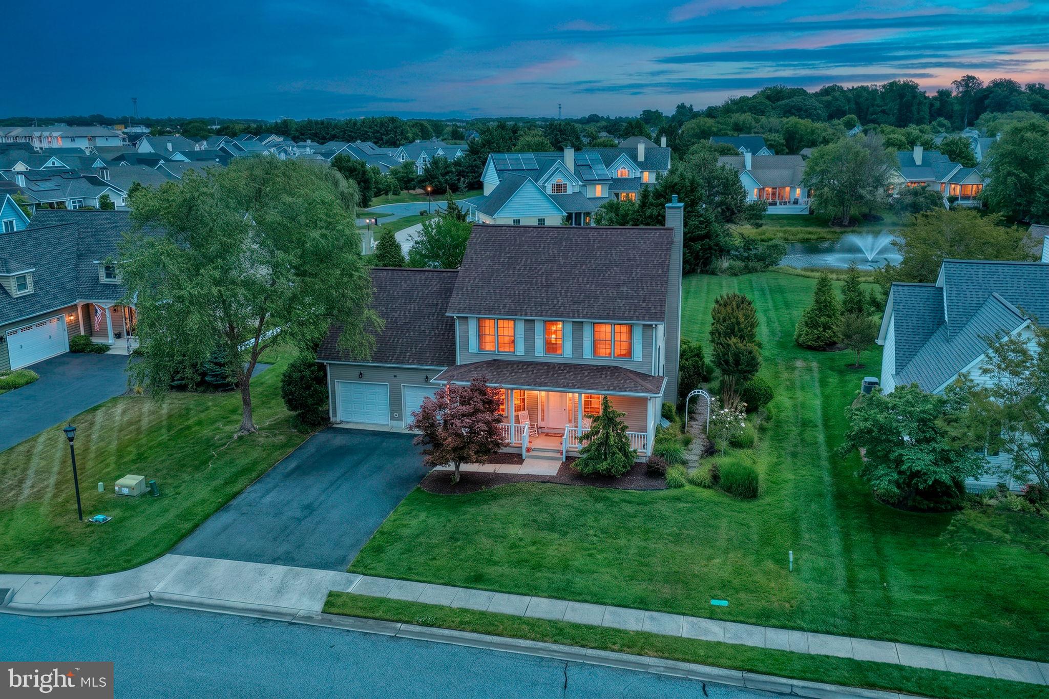 36 Kenmare Way Rehoboth Beach, DE 19971 - Photo 45 of 62 Charming home aglow at twilight.