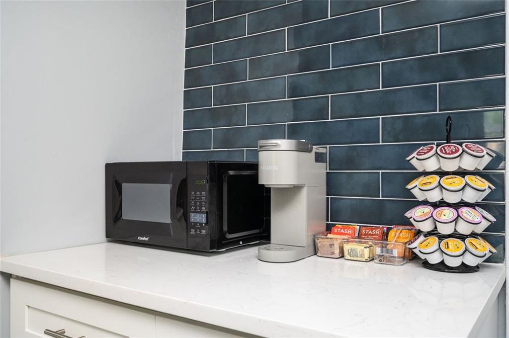 1778 Flintwood Drive Southeast Atlanta, GA 30316 - Photo 21 of 30 a room with toys and a shelf