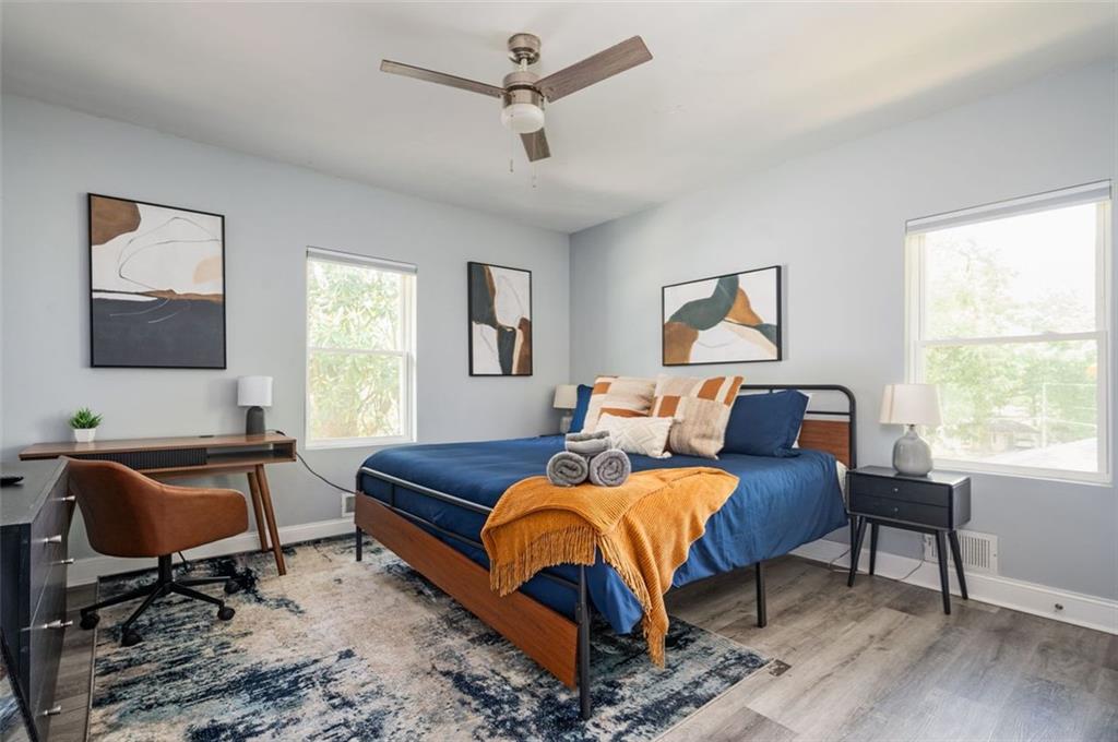 1778 Flintwood Drive Southeast Atlanta, GA 30316 - Photo 22 of 30 a bedroom with furniture and a window