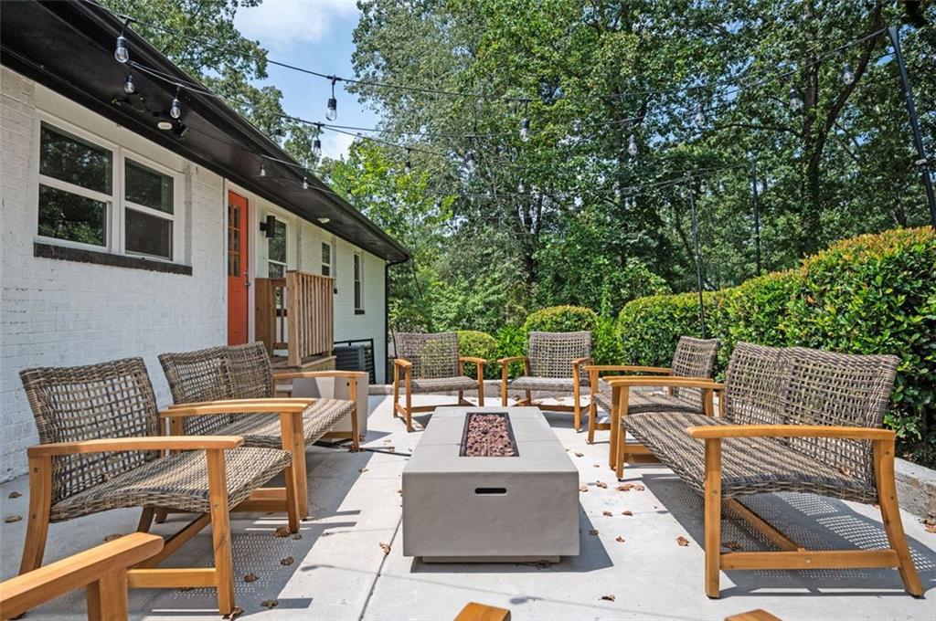 1778 Flintwood Drive Southeast Atlanta, GA 30316 - Photo 27 of 30 a view of backyard of house with seating area