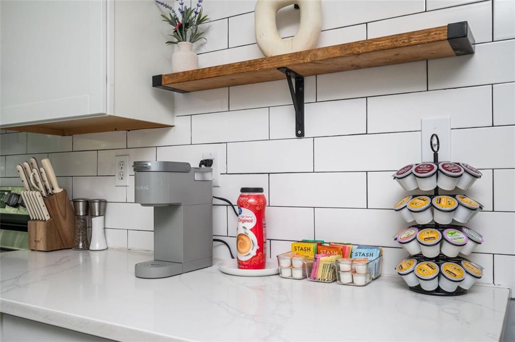 1778 Flintwood Drive Southeast Atlanta, GA 30316 - Photo 7 of 30 a utility room with lots of stuff