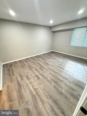 a view of a room with racks on the wall