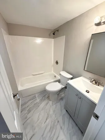 a utility room with cabinets