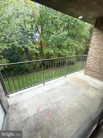 a view of balcony and trees