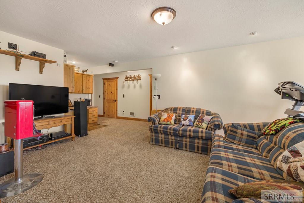 4548 East 250 North Rigby, ID 83442 - Photo 38 of 72 Basement Family Room