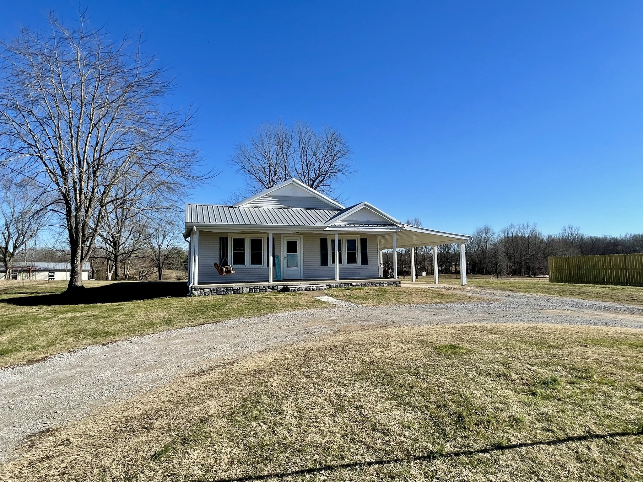 968 West Point Road Lawrenceburg, TN 38464 - Photo 4 of 21 a front view of a house with a yard
