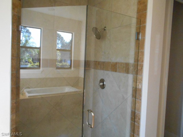 18225 Poplar Road Fort Myers, FL 33967 - Photo 11 of 21 a bathroom with a shower