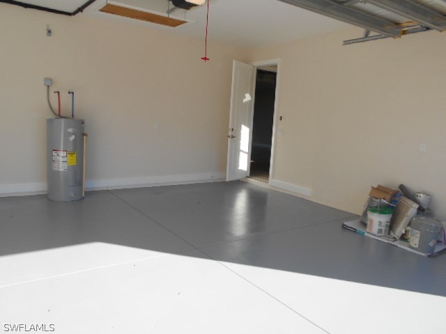 18225 Poplar Road Fort Myers, FL 33967 - Photo 21 of 21 a view of an empty room with wooden floor and a window