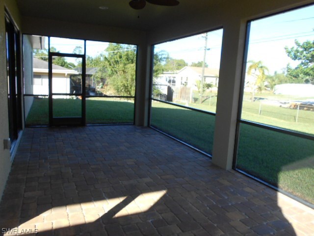 18225 Poplar Road Fort Myers, FL 33967 - Photo 9 of 21 a view of a porch and garden
