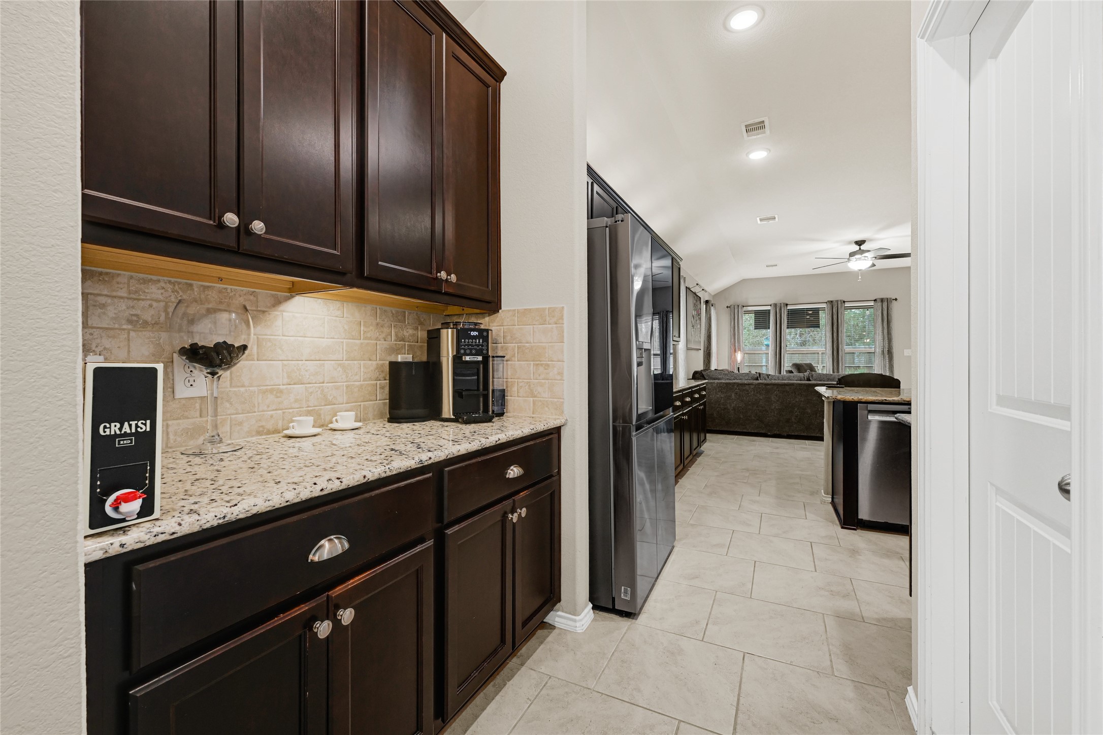 24303 Ravenna Landing Loop Spring, TX 77389 - Photo 11 of 46 a kitchen with stainless steel appliances granite countertop a sink counter space cabinets and a sink